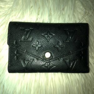 Louis Vuitton compact Empreinte curieuse wallet